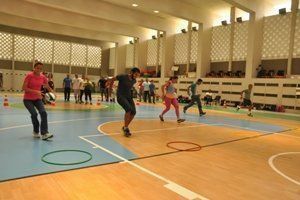 professores de Educação Física jogam Rugby em curso